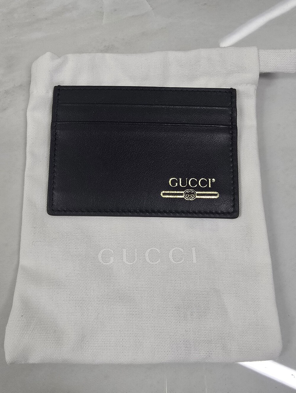 Gucci Black Leather Card Holder with Gold Logo